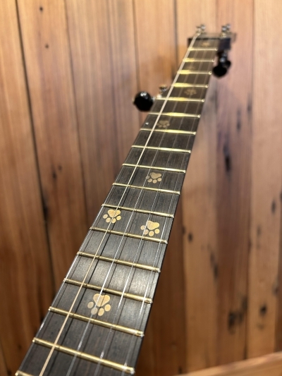 Paw Prints Fingerboard (brass powder inlay)