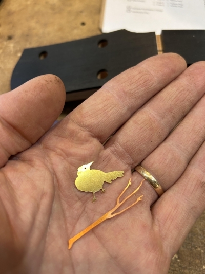 Crow on Branch peghead inlay, in process (copper/brass)